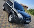 Черный Хендай Туксон, объемом двигателя 2 л и пробегом 240 тыс. км за 7900 $, фото 7 на Automoto.ua