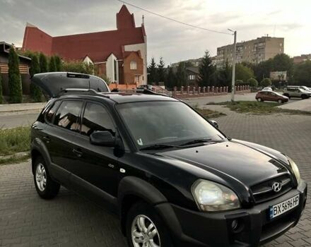 Черный Хендай Туксон, объемом двигателя 2.7 л и пробегом 266 тыс. км за 7700 $, фото 1 на Automoto.ua