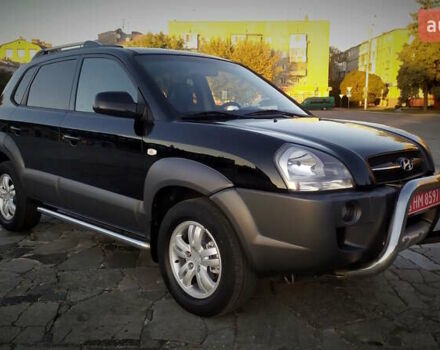 Черный Хендай Туксон, объемом двигателя 2 л и пробегом 230 тыс. км за 8600 $, фото 32 на Automoto.ua