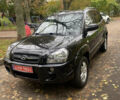 Черный Хендай Туксон, объемом двигателя 2 л и пробегом 178 тыс. км за 7860 $, фото 2 на Automoto.ua