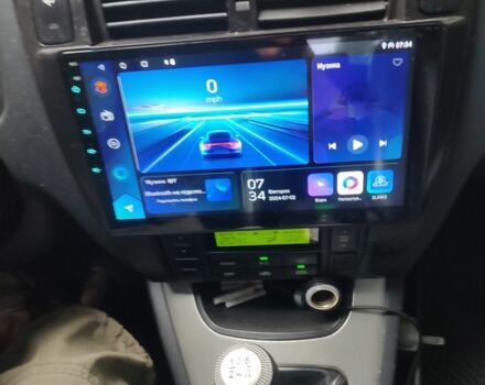 Черный Хендай Туксон, объемом двигателя 2 л и пробегом 160 тыс. км за 7600 $, фото 6 на Automoto.ua