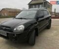 Черный Хендай Туксон, объемом двигателя 2 л и пробегом 210 тыс. км за 8999 $, фото 35 на Automoto.ua