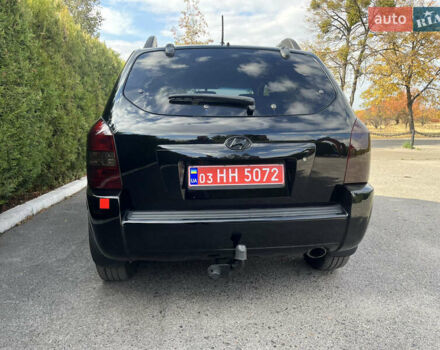 Черный Хендай Туксон, объемом двигателя 2 л и пробегом 256 тыс. км за 7800 $, фото 8 на Automoto.ua