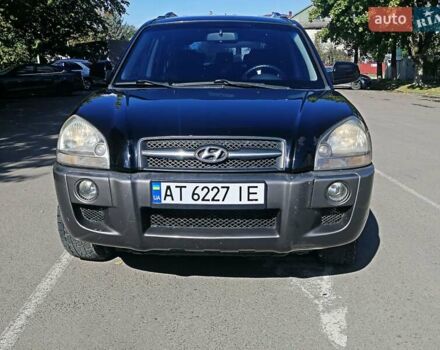 Черный Хендай Туксон, объемом двигателя 2 л и пробегом 270 тыс. км за 10250 $, фото 12 на Automoto.ua