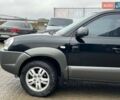 Черный Хендай Туксон, объемом двигателя 2 л и пробегом 163 тыс. км за 7690 $, фото 9 на Automoto.ua