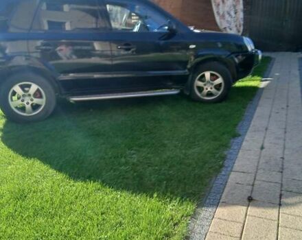 Черный Хендай Туксон, объемом двигателя 2 л и пробегом 15 тыс. км за 6200 $, фото 4 на Automoto.ua