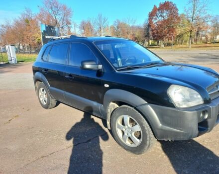 Черный Хендай Туксон, объемом двигателя 2 л и пробегом 227 тыс. км за 7300 $, фото 1 на Automoto.ua