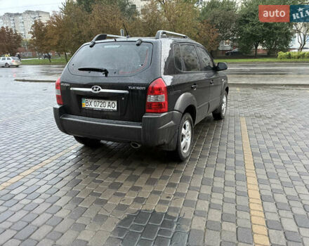 Черный Хендай Туксон, объемом двигателя 2 л и пробегом 176 тыс. км за 7450 $, фото 5 на Automoto.ua