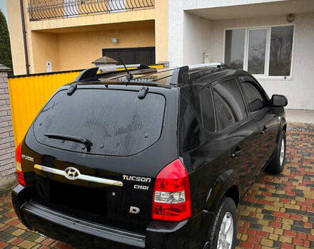 Черный Хендай Туксон, объемом двигателя 2 л и пробегом 151 тыс. км за 9100 $, фото 39 на Automoto.ua