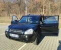 Черный Хендай Туксон, объемом двигателя 1.98 л и пробегом 210 тыс. км за 7200 $, фото 9 на Automoto.ua