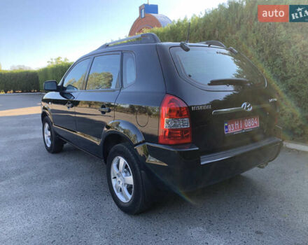 Чорний Хендай Туксон, об'ємом двигуна 2 л та пробігом 56 тис. км за 9500 $, фото 7 на Automoto.ua