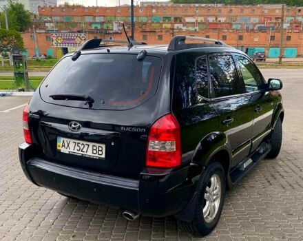 Черный Хендай Туксон, объемом двигателя 2 л и пробегом 175 тыс. км за 8900 $, фото 11 на Automoto.ua