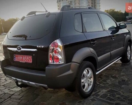 Черный Хендай Туксон, объемом двигателя 2 л и пробегом 230 тыс. км за 8600 $, фото 19 на Automoto.ua