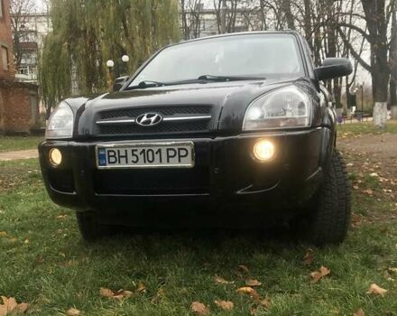 Черный Хендай Туксон, объемом двигателя 2 л и пробегом 210 тыс. км за 8999 $, фото 6 на Automoto.ua