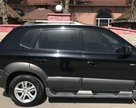 Чорний Хендай Туксон, об'ємом двигуна 2 л та пробігом 150 тис. км за 8100 $, фото 3 на Automoto.ua