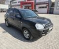 Чорний Хендай Туксон, об'ємом двигуна 2 л та пробігом 339 тис. км за 7000 $, фото 3 на Automoto.ua