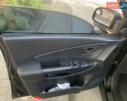 Черный Хендай Туксон, объемом двигателя 1.98 л и пробегом 232 тыс. км за 9100 $, фото 15 на Automoto.ua