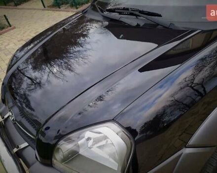 Чорний Хендай Туксон, об'ємом двигуна 2 л та пробігом 229 тис. км за 8600 $, фото 55 на Automoto.ua