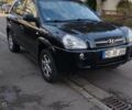 Черный Хендай Туксон, объемом двигателя 2 л и пробегом 84 тыс. км за 9500 $, фото 1 на Automoto.ua
