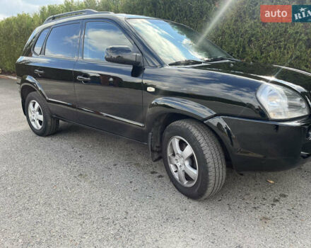 Черный Хендай Туксон, объемом двигателя 2 л и пробегом 256 тыс. км за 7800 $, фото 17 на Automoto.ua