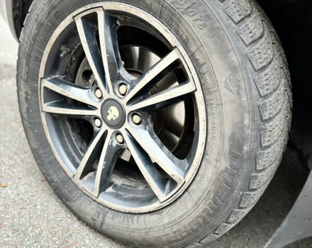 Черный Хендай Туксон, объемом двигателя 1.99 л и пробегом 266 тыс. км за 7500 $, фото 13 на Automoto.ua