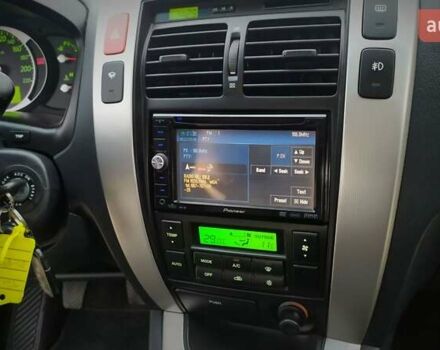 Чорний Хендай Туксон, об'ємом двигуна 2 л та пробігом 229 тис. км за 8600 $, фото 117 на Automoto.ua