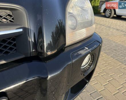 Черный Хендай Туксон, объемом двигателя 2 л и пробегом 270 тыс. км за 8200 $, фото 13 на Automoto.ua