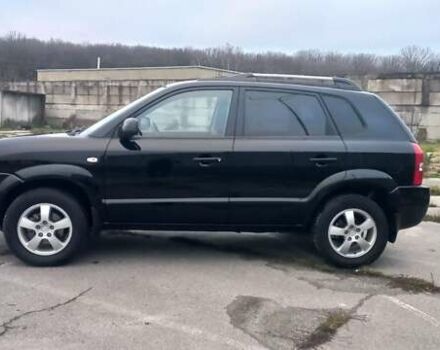 Черный Хендай Туксон, объемом двигателя 1.98 л и пробегом 155 тыс. км за 7999 $, фото 4 на Automoto.ua