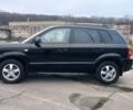 Черный Хендай Туксон, объемом двигателя 1.98 л и пробегом 155 тыс. км за 7999 $, фото 4 на Automoto.ua