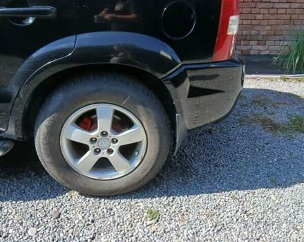 Черный Хендай Туксон, объемом двигателя 2 л и пробегом 15 тыс. км за 6200 $, фото 6 на Automoto.ua