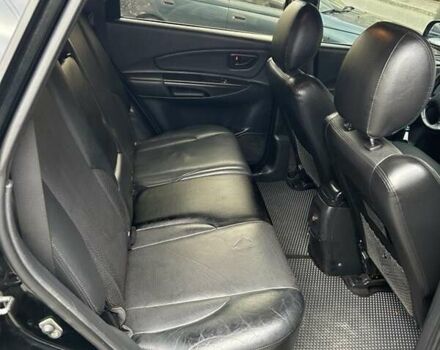 Черный Хендай Туксон, объемом двигателя 1.98 л и пробегом 147 тыс. км за 8000 $, фото 15 на Automoto.ua