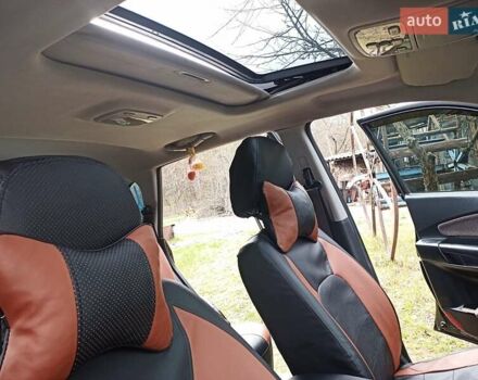Черный Хендай Туксон, объемом двигателя 2 л и пробегом 240 тыс. км за 8200 $, фото 5 на Automoto.ua