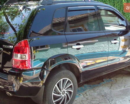 Черный Хендай Туксон, объемом двигателя 1.98 л и пробегом 234 тыс. км за 7800 $, фото 9 на Automoto.ua