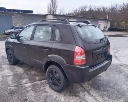 Черный Хендай Туксон, объемом двигателя 2 л и пробегом 280 тыс. км за 3500 $, фото 4 на Automoto.ua