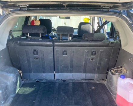 Чорний Хендай Туксон, об'ємом двигуна 1.98 л та пробігом 215 тис. км за 7540 $, фото 12 на Automoto.ua