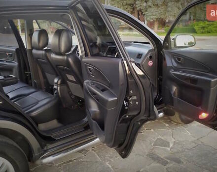 Черный Хендай Туксон, объемом двигателя 2 л и пробегом 230 тыс. км за 8600 $, фото 179 на Automoto.ua