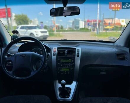 Черный Хендай Туксон, объемом двигателя 2 л и пробегом 227 тыс. км за 8200 $, фото 19 на Automoto.ua