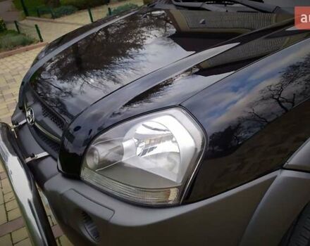 Чорний Хендай Туксон, об'ємом двигуна 2 л та пробігом 229 тис. км за 8600 $, фото 56 на Automoto.ua