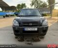 Черный Хендай Туксон, объемом двигателя 2 л и пробегом 200 тыс. км за 7400 $, фото 1 на Automoto.ua