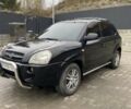 Чорний Хендай Туксон, об'ємом двигуна 1.99 л та пробігом 345 тис. км за 7600 $, фото 6 на Automoto.ua