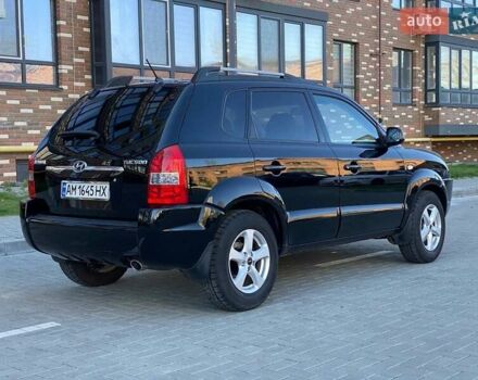 Черный Хендай Туксон, объемом двигателя 1.98 л и пробегом 286 тыс. км за 7300 $, фото 8 на Automoto.ua