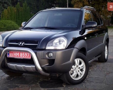 Черный Хендай Туксон, объемом двигателя 2 л и пробегом 230 тыс. км за 8600 $, фото 86 на Automoto.ua