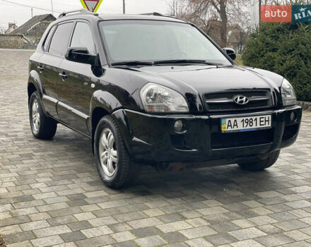 Черный Хендай Туксон, объемом двигателя 2 л и пробегом 180 тыс. км за 7700 $, фото 7 на Automoto.ua