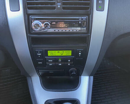 Черный Хендай Туксон, объемом двигателя 1.98 л и пробегом 197 тыс. км за 8000 $, фото 36 на Automoto.ua