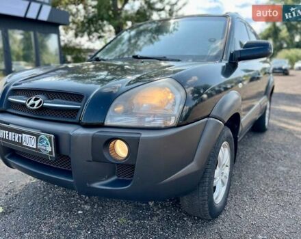 Черный Хендай Туксон, объемом двигателя 2 л и пробегом 227 тыс. км за 8200 $, фото 31 на Automoto.ua