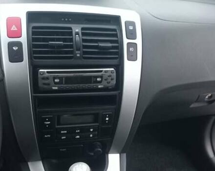 Черный Хендай Туксон, объемом двигателя 1.98 л и пробегом 155 тыс. км за 7999 $, фото 32 на Automoto.ua