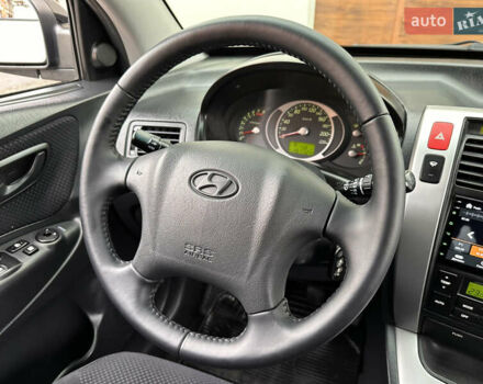 Хендай Туксон 2007 в Ужгороде на Automoto.ua Черный Хендай Туксон, объемом двигателя 1.98 л и пробегом 157 тыс. км за 7300 $, фото 31 на Automoto.ua