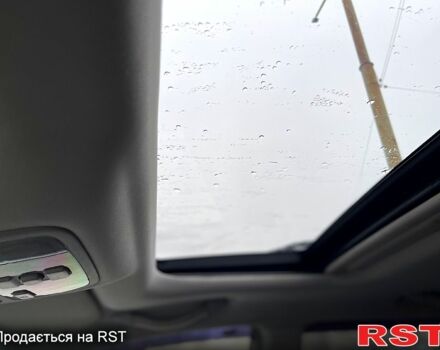 Черный Хендай Туксон, объемом двигателя 2 л и пробегом 190 тыс. км за 7800 $, фото 1 на Automoto.ua