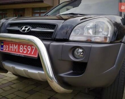 Чорний Хендай Туксон, об'ємом двигуна 2 л та пробігом 229 тис. км за 8600 $, фото 58 на Automoto.ua