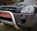 Чорний Хендай Туксон, об'ємом двигуна 2 л та пробігом 229 тис. км за 8600 $, фото 58 на Automoto.ua